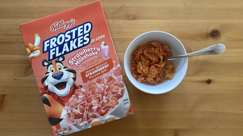 Frosted Flakes Strawberry Milkshake in white bowl on table