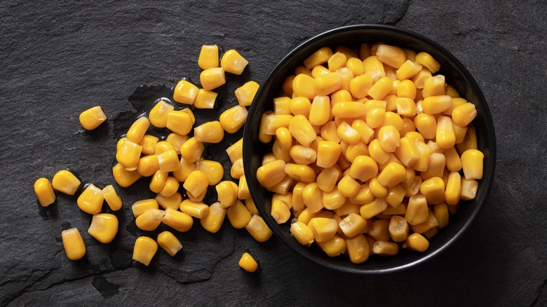 Corn kernels in a black bowl
