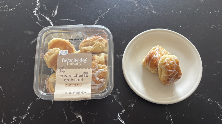Favorite Day cream cheese croissant tiny treats package next to mini croissants on plate