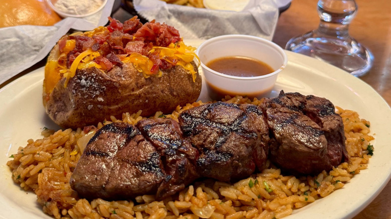 Filet medallions, rice, and a baked potato from Texas Roadhouse
