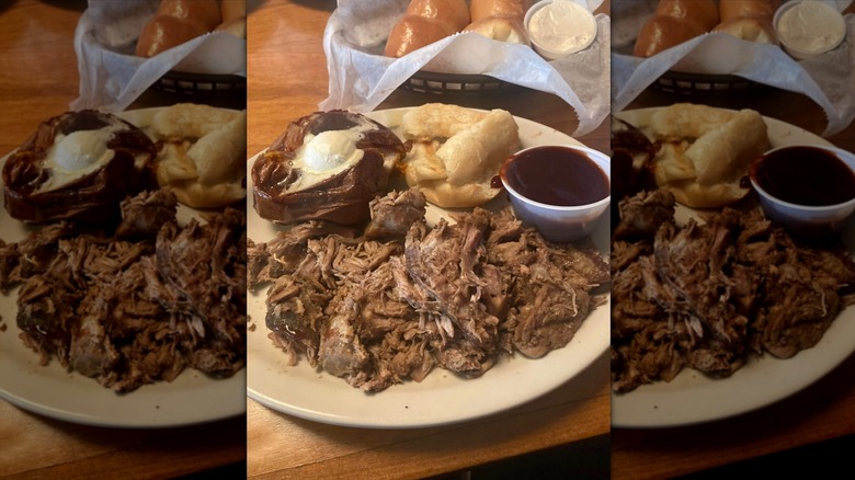 Texas Roadhouse pulled pork dinner on white plate