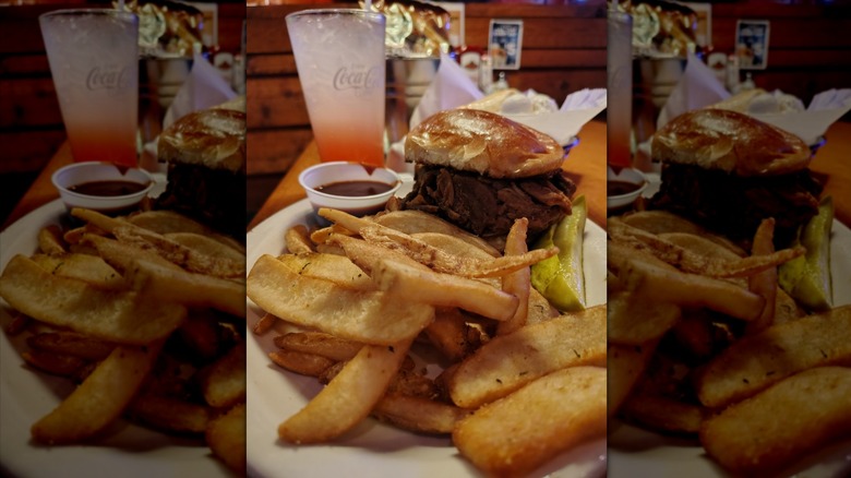 Texas Roadhouse pulled pork sandwich with fries and pickle spear