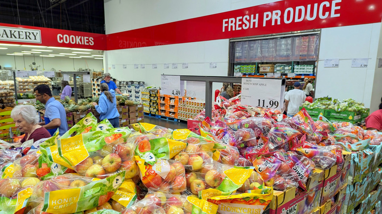 Apples in bags in Costco's produce section