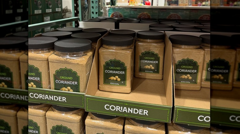 Ground coriander in large plastic jars at Costco