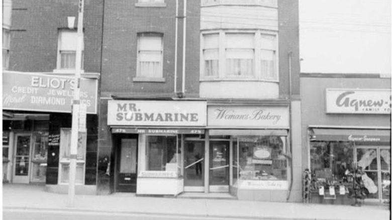 Vintage black and white photo of street view of original Mr. Sub location