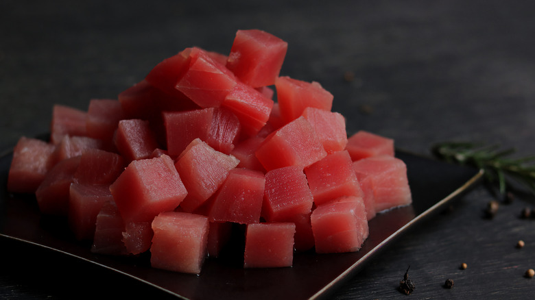Raw fresh tuna cubes cut to the right size for poke.