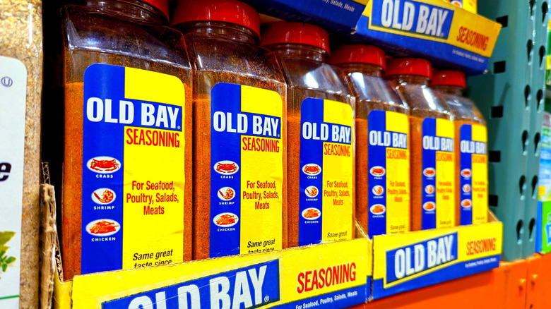 A stack of blue and white seasoning containers