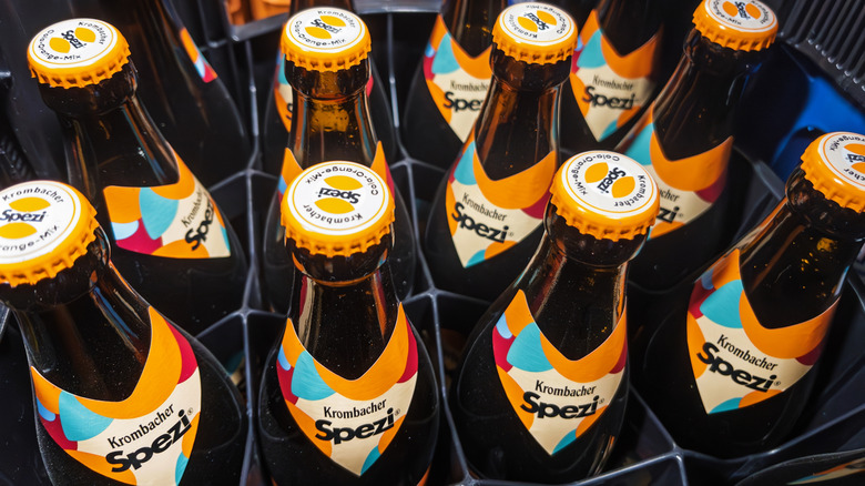 Close-up of tops of Spezi soda bottles