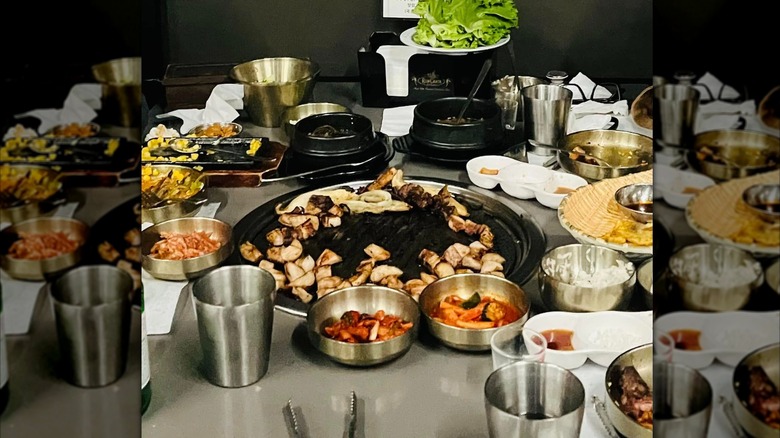 Korean BBQ table spread at Hanu K