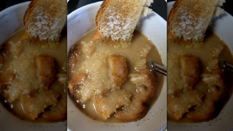 mirrored image of coffee soup in a bowl with bread