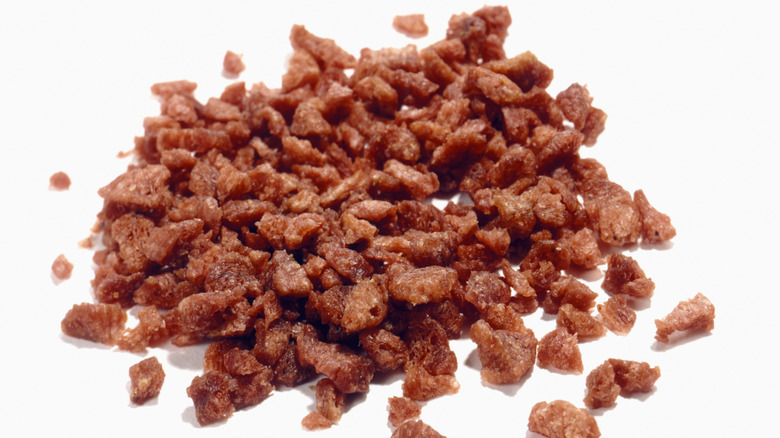 Bacon bits on white background