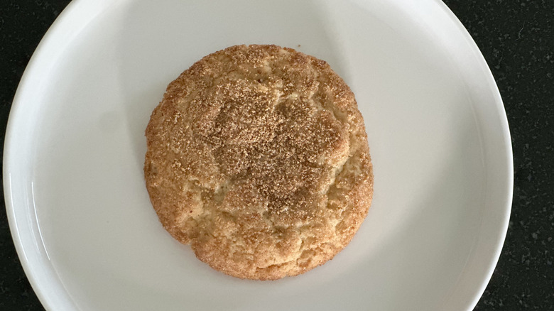 Overhead image of white plate with snickerdoodle cookie