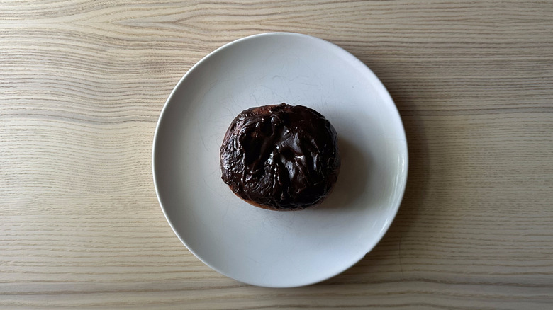 7-Eleven Boston cream donut on white plate