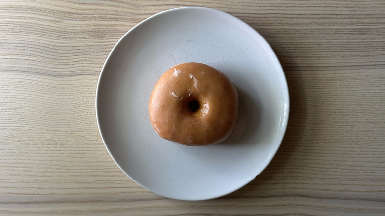 7-Eleven glazed donut on white plate