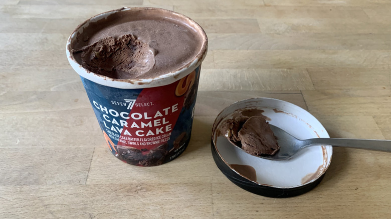 opened Chocolate Caramel Lava Cake pint with spoonful of ice cream next to it