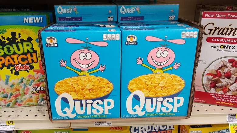 Two boxes of Quisp cereal on a store shelf