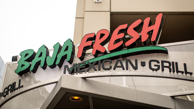 Closeup of Baja Fresh Mexican Grill sign on the restaurant building facade