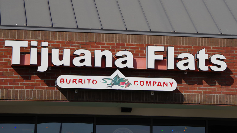 Close up of Tijuana Flats sign on the exterior of building