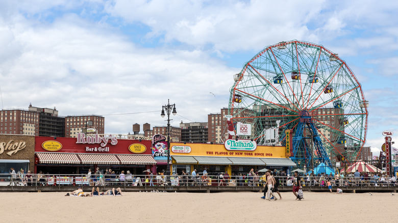view of Coney Island boardwalk from the bach