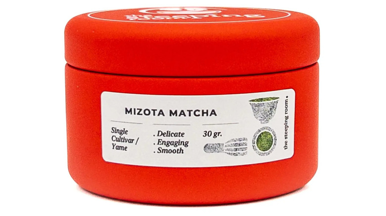 Short, wide container of Mizota matcha with details listed on label