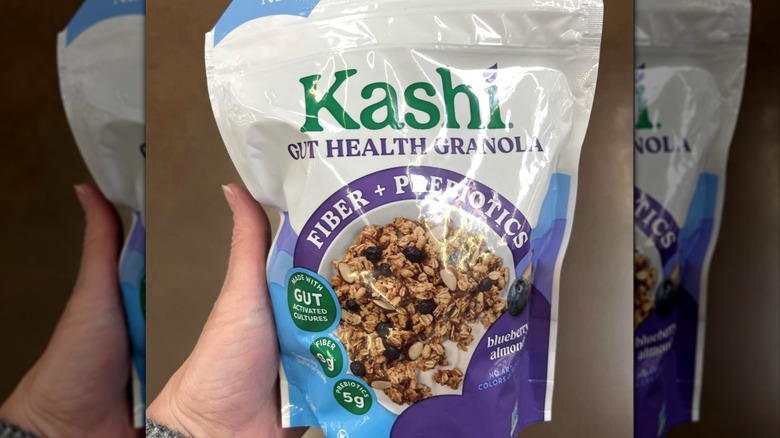 person holding kasi gut-health granola