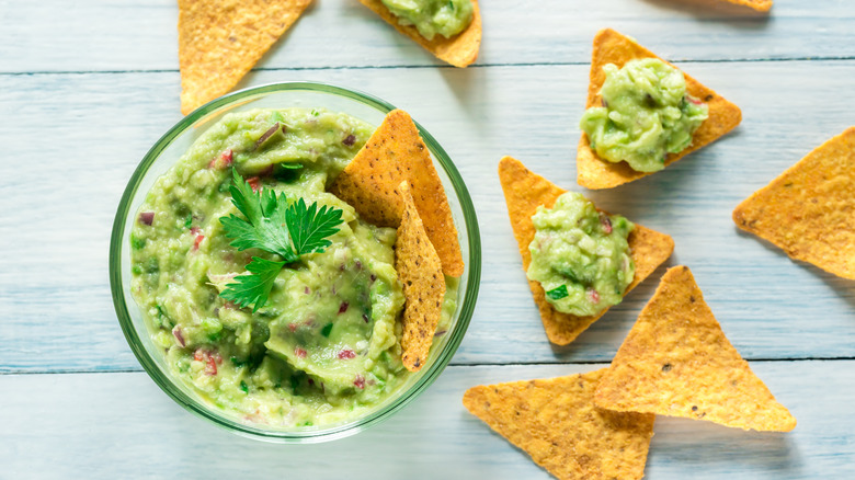 Bowl of guacamole with tortilla chips