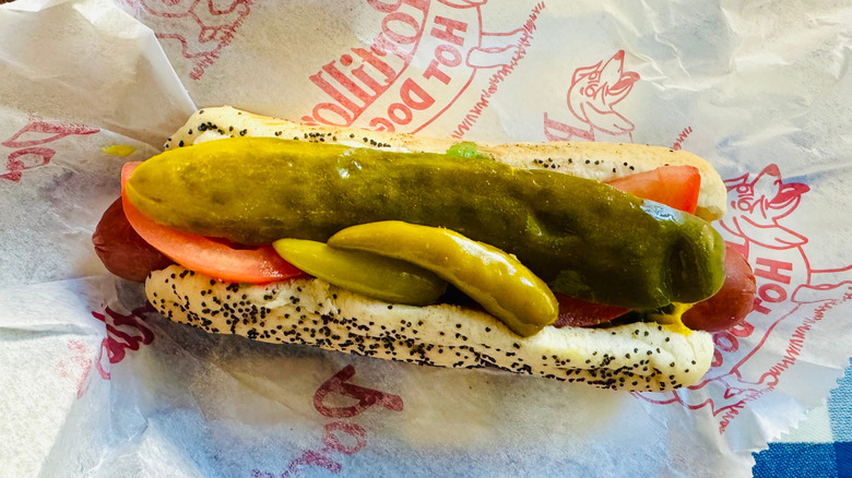 A Portillo's hot dog loaded with toppings