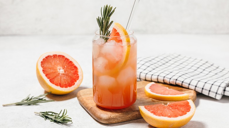 Grapefruit cocktail with fresh fruit and rosemary