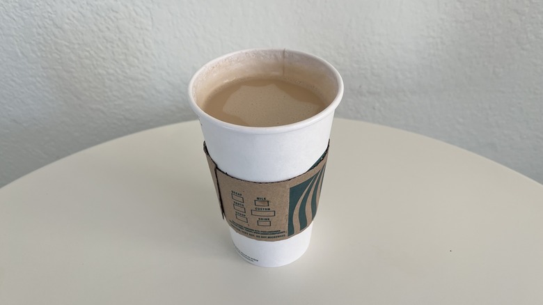 Oat latte cup on a table