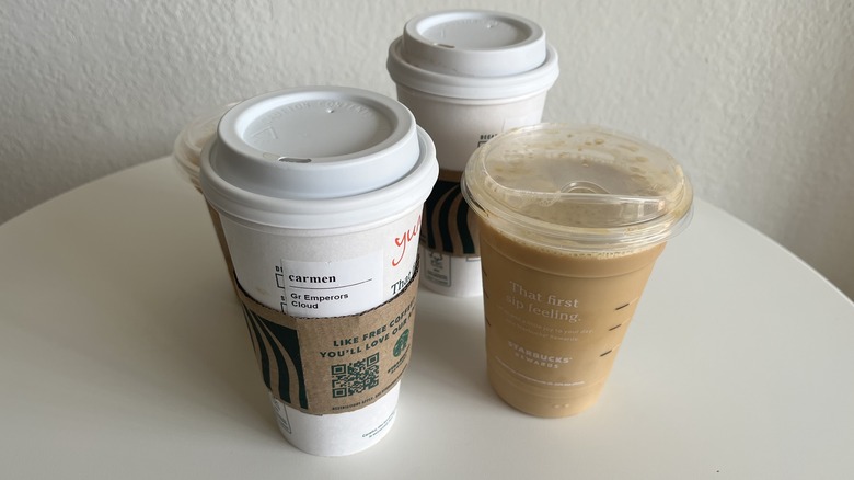 Different Starbucks drinks on a table