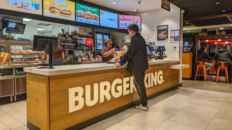 Person ordering at Burger King