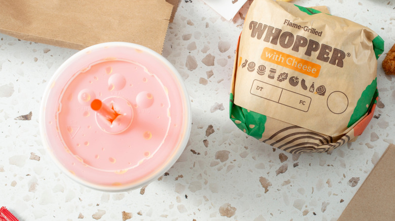 A top down view of a Burger King combo meal with a milkshake