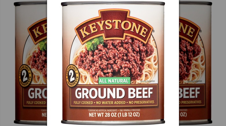 mirrored image of Keystone canned ground beef on white background