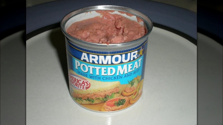 Open can of Armour Potted meat on plate, mirrored image