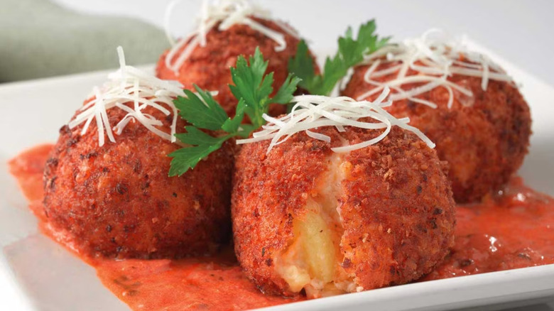 Cheesecake Factory fried macaroni and cheese balls on a plate