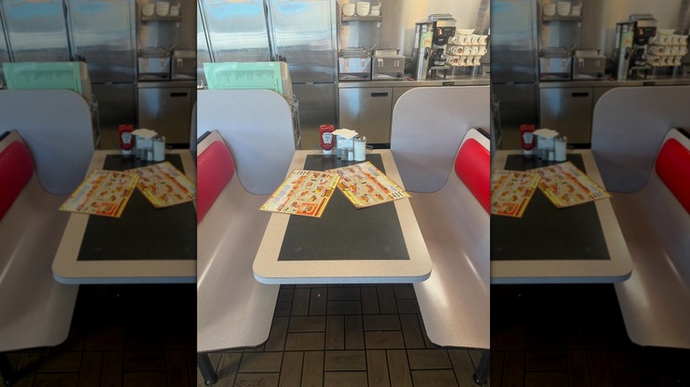 Waffle House booth with menus on table