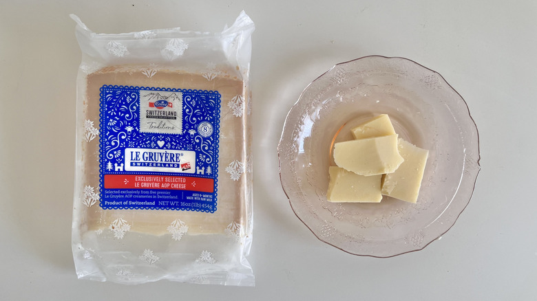 Emmi Le Gruyère pieces on a plate