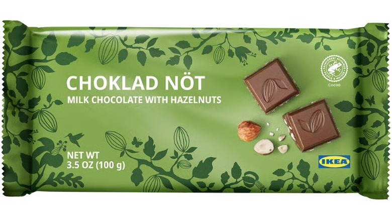 A beauty shot of the Choklad Nöt milk chocolate bar with hazelnuts on a white background