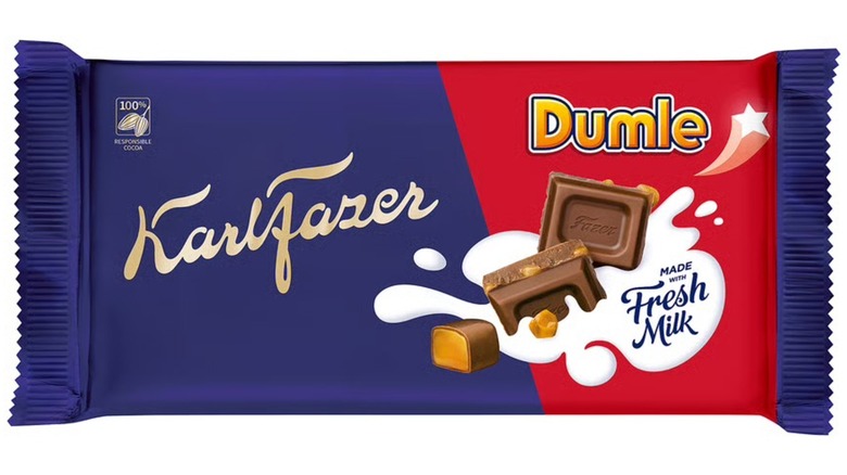A beauty shot of the Fazer milk chocolate bar with Dumle toffee pieces on a white background