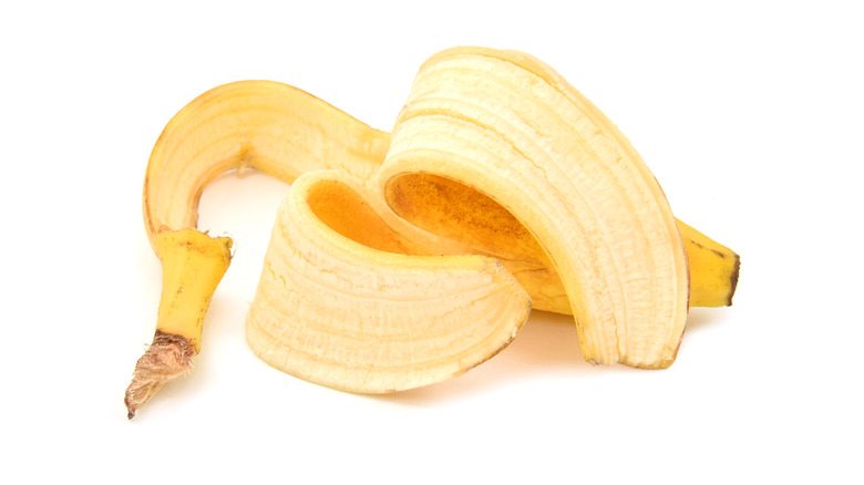 Banana peel on white background