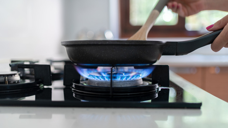 pan centered on gas burner