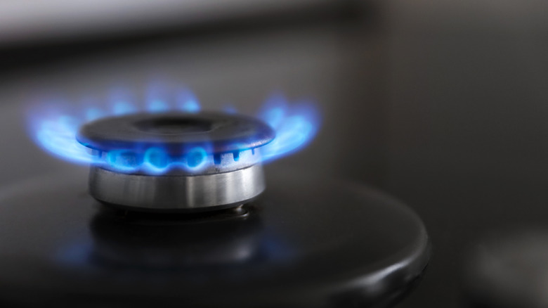gas burner lit with flame