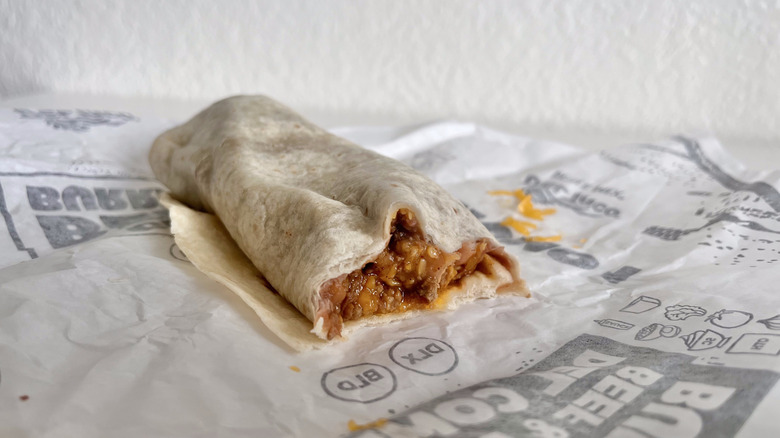 Combo Beef & Bean Burrito on paper wrapper