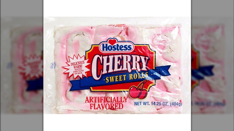 A package of pink-tinted Hostess Cherry Sweet Rolls featuring a bright red logo