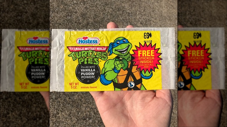 The paper wrapper from a Hostess TMNT pie featuring a smiling Leonardo holding a green pastry