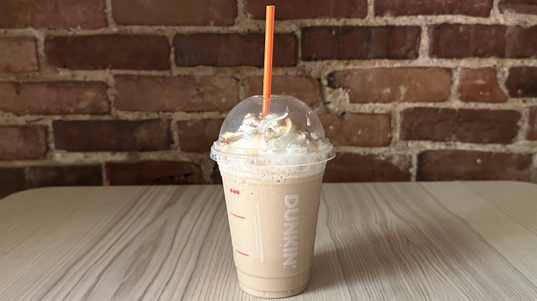 Dunkin' Caramel Creme Coffee Chiller on wooden table