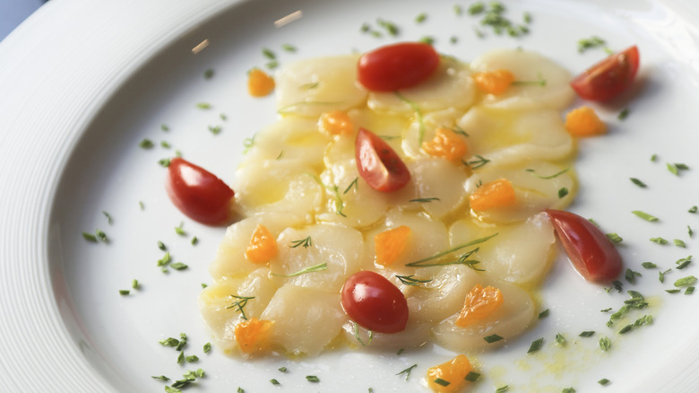 scallop crudo with tomato and herbs