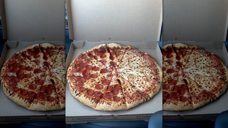 Half cheese, half pepperoni Costco pizza in pizza box