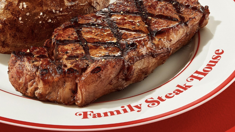 Steak on a Sizzler plate that reads "Family Steak House."
