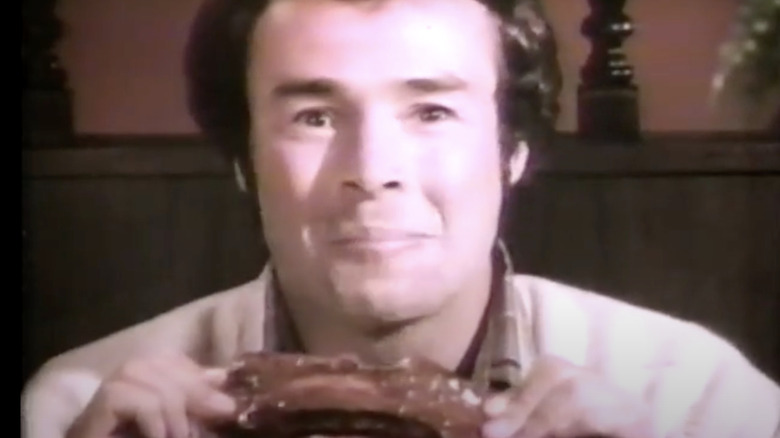 A man eating ribs in a 1984 Sizzler commercial.